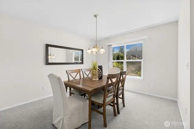 The dining room is spacious and could easily be a flex space for an office or workout area.