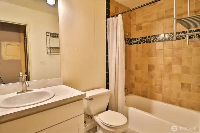 Full bathroom, new flooring.