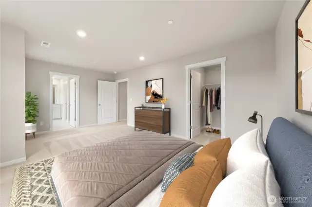 Primary bedroom with 5-piece attached bathroom and walk-in closet. Actual home is under construction and materials, colors, and finishes will vary. See site agent for details.