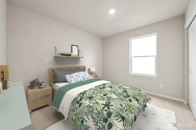 One of the bedrooms on the 2nd level. Actual home is under construction and materials, colors, and finishes will vary. See site agent for details.