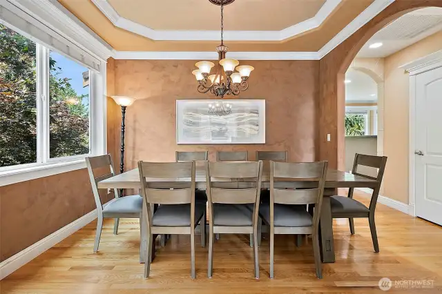 Dining room is spacious and elegant with venetian plaster on the walls, cove ceiling & crown molding  makes this room feel like you are dining in Tuscany.
