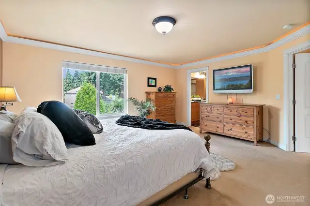Upstairs is the expansive primary suite featuring elegant crown molding with recessed lighting to create an ambiance and plenty of space to make this your own private retreat.