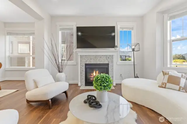 Living room with gas fireplace.