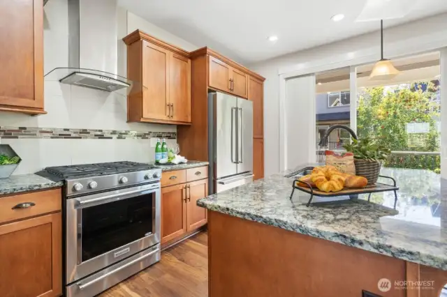 Kitchen with stainless steel appliances.