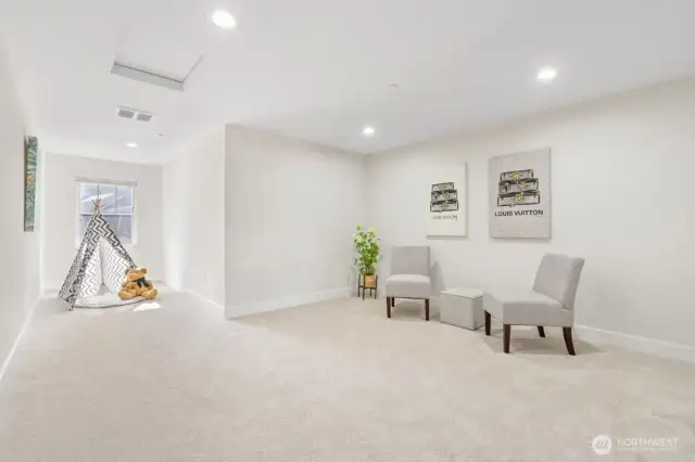 Huge bedroom on top floor: can be rec room, office or workout room.