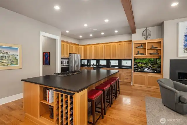 Large kitchen island features seating for 4-6 people