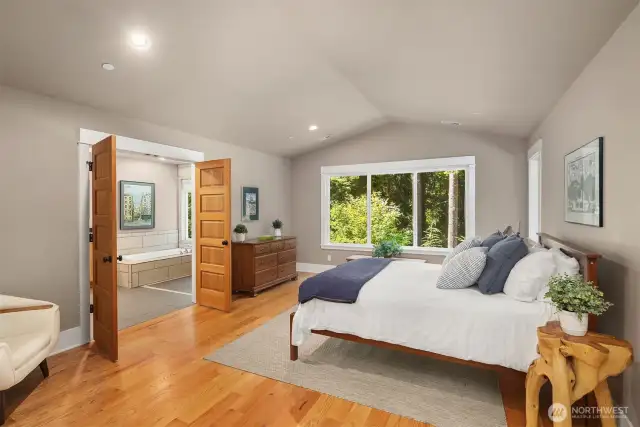 Primary bedroom opens to large primary bath