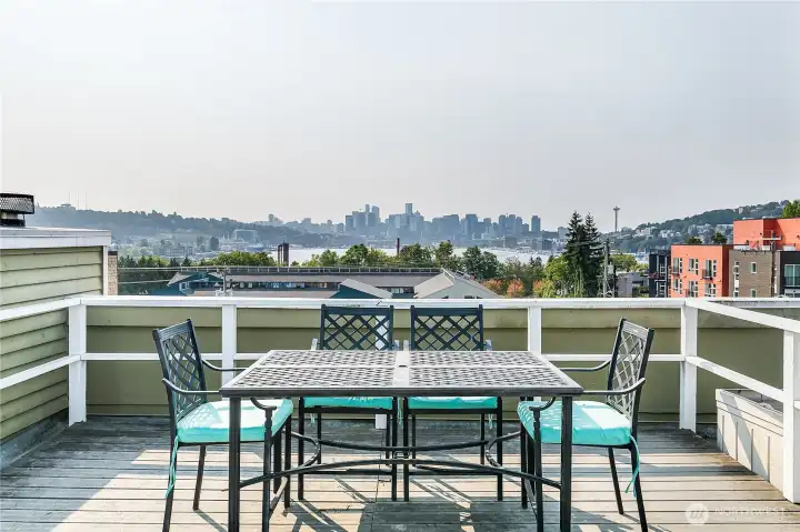 Rooftop deck has sweeping views of the city and Lake Union, perched just above Gas Works Park