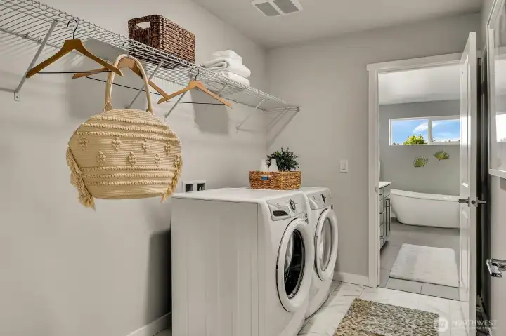 Laundry room has direct access from the primary master bath