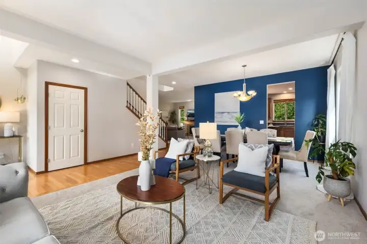 Living room and dining room are connected for a great entertaining space.