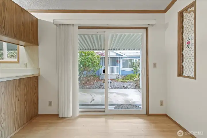 Dining room with slider to the carport.