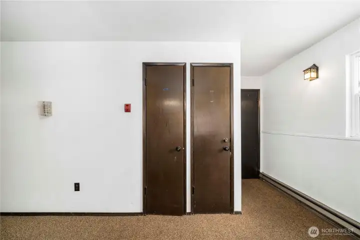 Convenient hallway storage closet offering extra space for gear and personal items.