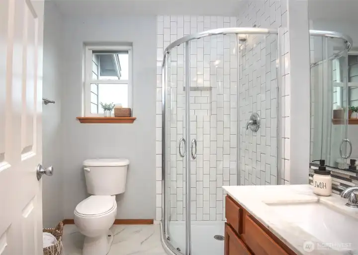 Primary bathroom with beautiful updates.