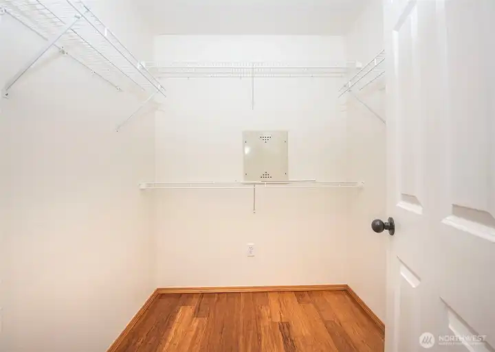 Huge primary walk in closet.