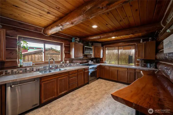 Enjoy the open layout of the kitchen with bar seating