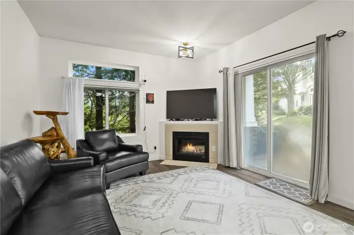Gas fireplace and private patio from living room