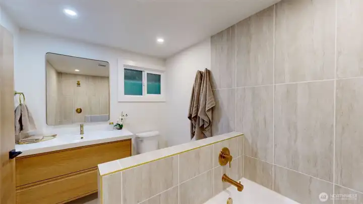 Unwind in the primary ensuite's spa-inspired oasis, complete with modern updates.