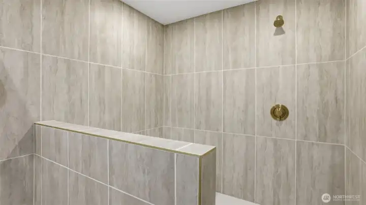 Spa-like serenity awaits in the primary ensuite, featuring a luxurious shower and soaking tub designed for relaxation.