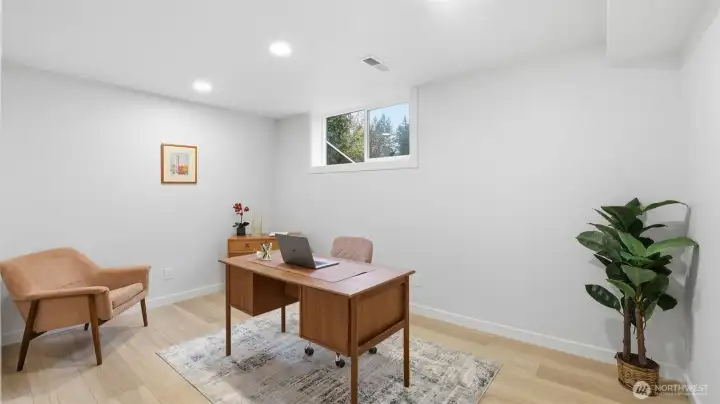 Lower-level guestroom doubles as a cozy office space.