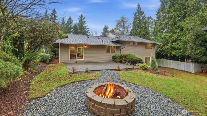 A serene backyard oasis perfect for relaxing evenings and laid-back outdoor vibes, with direct access to the golf course.