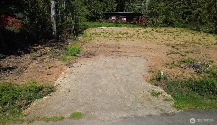 Lot is cleared, level with water and power to the site.