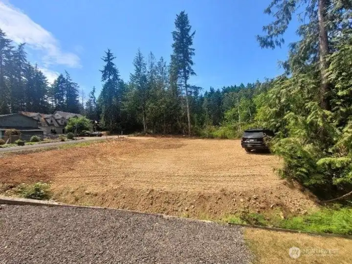 Lot is cleared, level and very useable with great level access into property off Wildwood Rd.