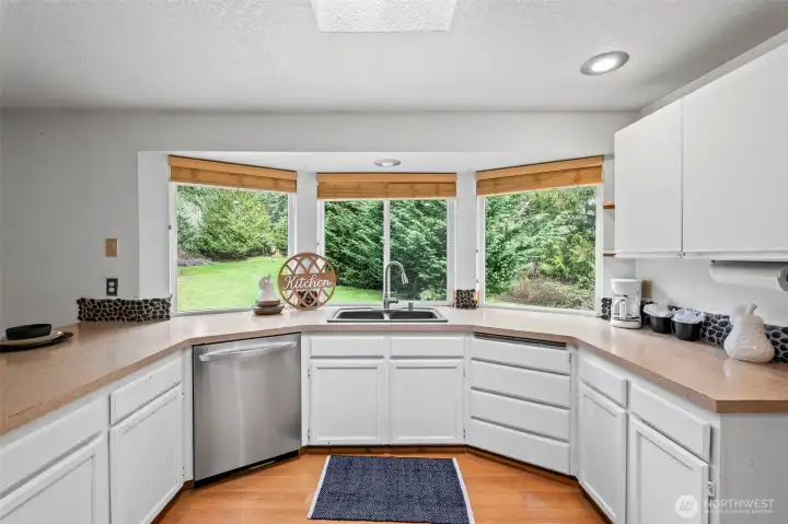 Enjoy the views of the backyard while cooking in the kitchen