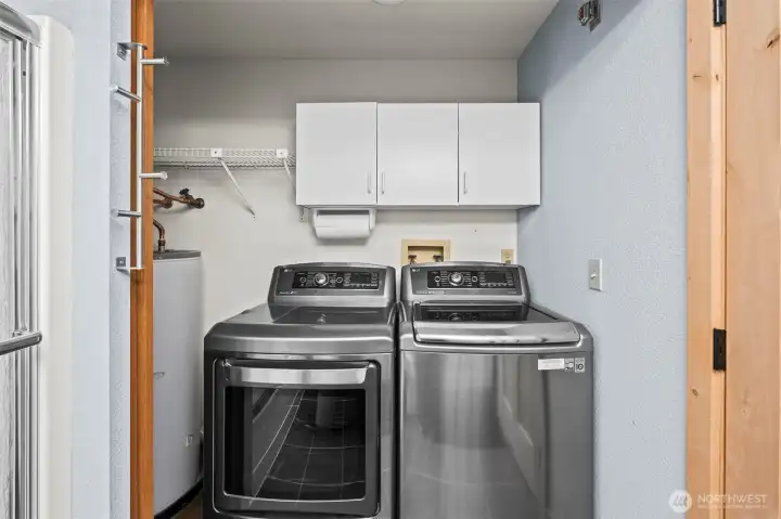 Washer and Dryer located off the bathroom
