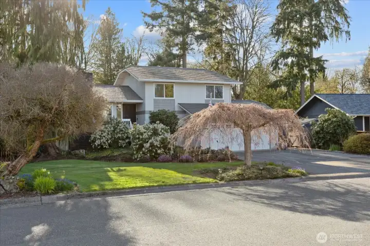 Tucked away on a quiet dead-end street, this home offers a sense of privacy and calm that’s hard to come by. The beautifully manicured gardens create a welcoming first impression and reflect true pride of ownership.