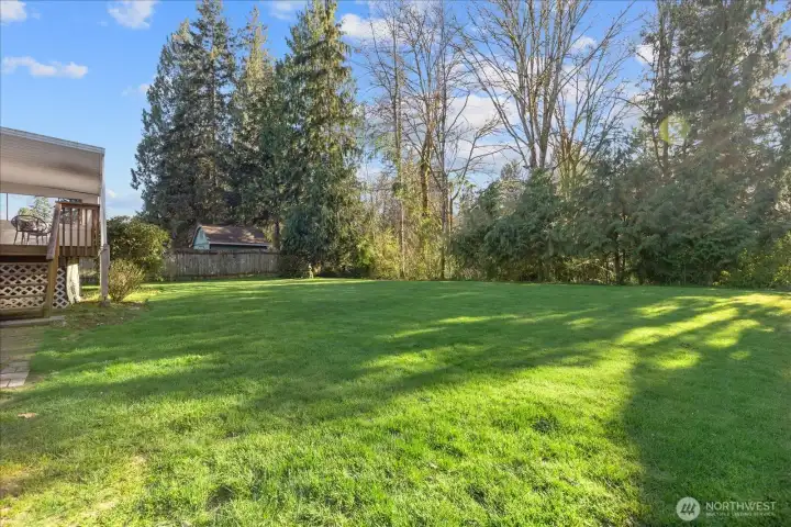 The backyard provides room to garden, play, or simply relax.