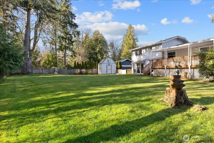 Mature landscaping enhances both beauty and privacy.