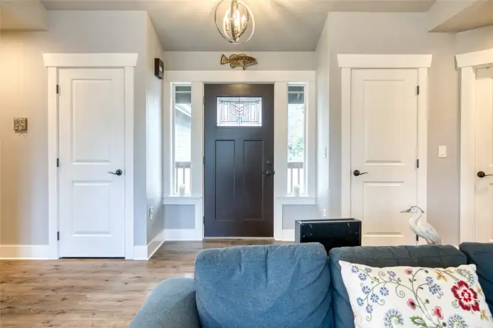 Open entry with 2 coat closets for all your storage needs