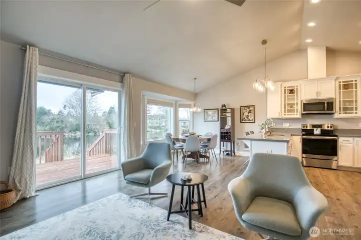 Living space has cathedral ceilings and so much natural light from the sliding doors and large windows