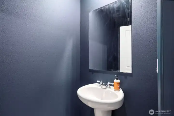 Main-level half bath with sink and toilet (not shown)