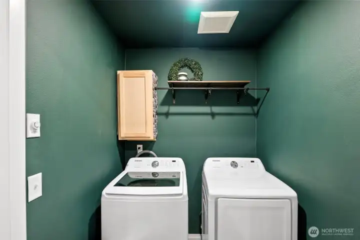 Washer and Dryer nook behind French doors and conveniently located amoung the 4 bedrooms!