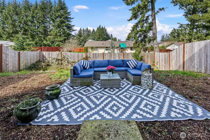 Step outside to the backyard surrounded by your own fence Step outside to the backyard surrounded by your own fence