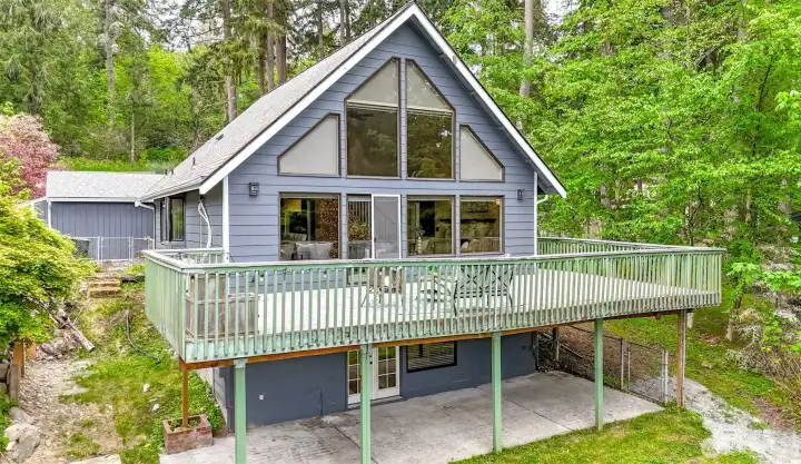 Fantastic opportunity to experience the beauty of Ohop Lake from this full length deck and patio.