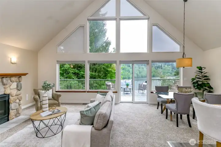 Gorgeous open floor plan with great room, dining and kitchen. Full length deck with stunning views of the lake. Vaulted ceilings, custom electric blinds for these amazing picture windows.