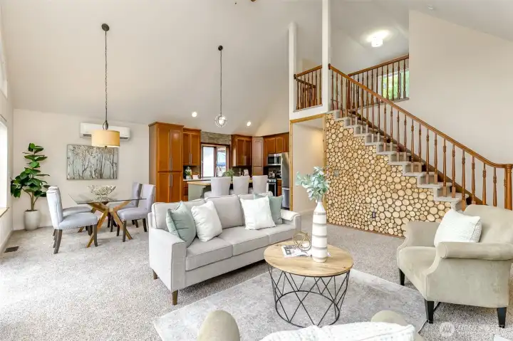 Vaulted ceilings and large loft bedroom with two closets.