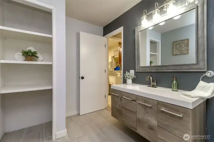 Linen closet and just out the door is the utility room.