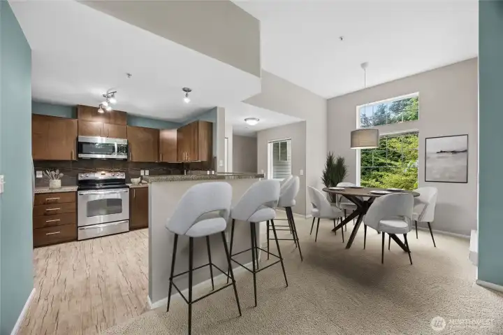 Seamless dining area that flows into the kitchen and living room — ideal for gathering and hosting.