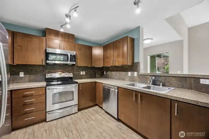 unctional kitchen with plenty of storage and space to cook, gather, and entertain.