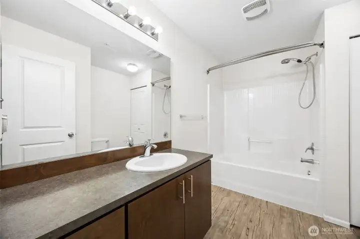 Well-appointed guest bathroom for added convenience.