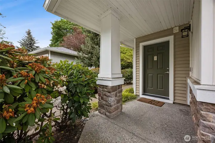 Private entrance to end-unit living with top-floor privacy.