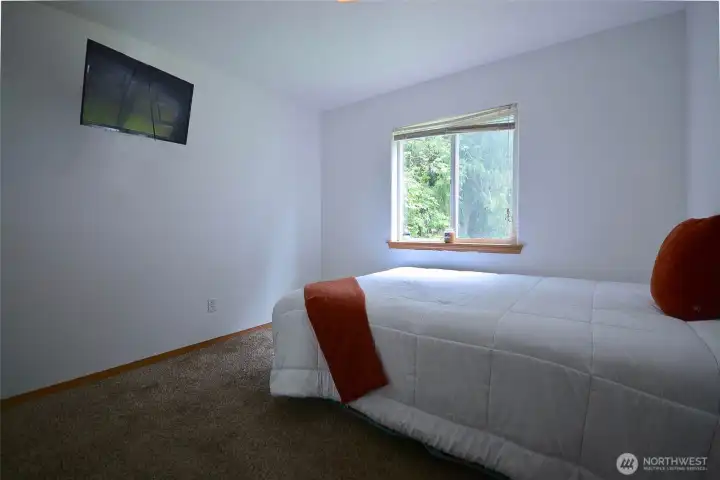 Third additional bedroom is comfortably sized and conveniently located near the guest bathroom, which features a full bath for family or visitors Third additional bedroom is comfortably sized and conveniently located near the guest bathroom, which features a full bath for family or visitors