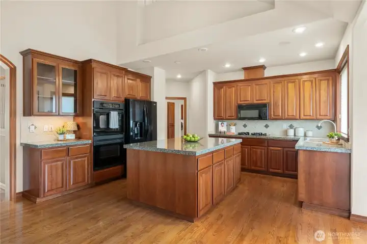 Abundant storage space, walk-in pantry, and a double oven for added convenience.