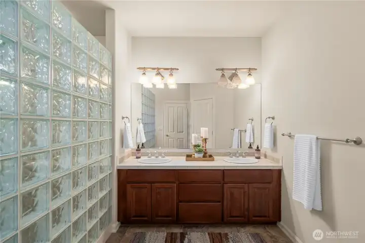 Primary ensuite with double sinks.