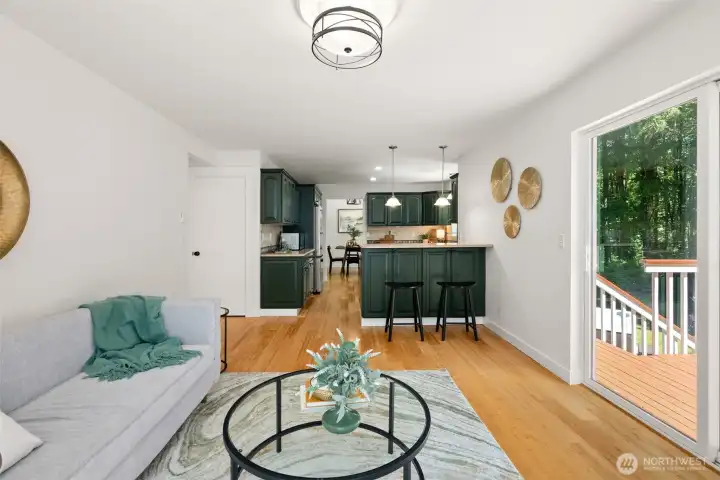 Great connection from the family room to the kitchen and the outdoor deck