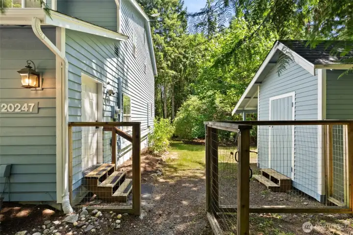 Gated side door access to the shed, yard and interior bonus room