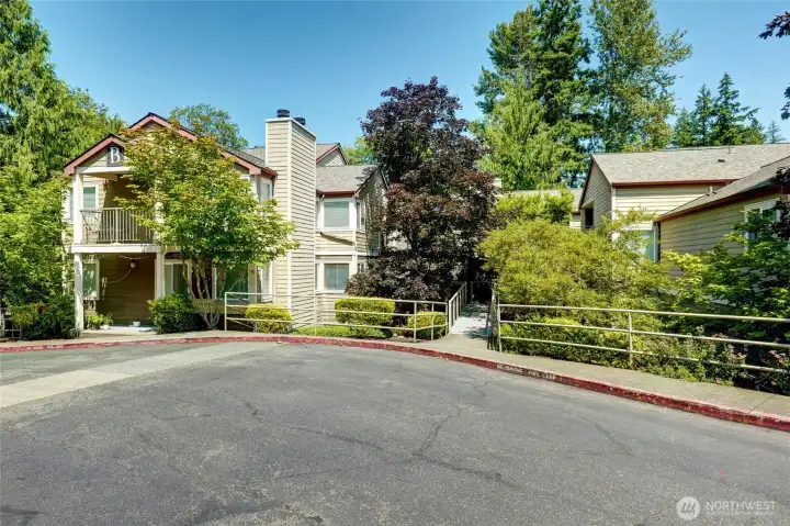 Building B with access to unit via central walkway. No stairs to unit entry Building B with access to unit via central walkway. No stairs to unit entry